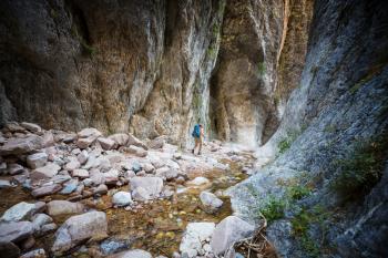 Man in hike in the slot canyon