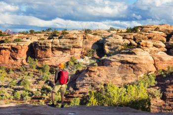 Hike in the Utah mountains. Hiking in unusual natural landscapes. Fantastic forms sandstone formations.