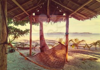 Wooden table with beach background. Travel background.