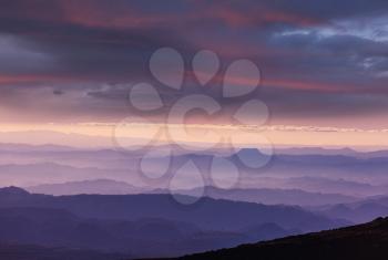 Mountains silhouette at sunrise. Beautiful natural background.