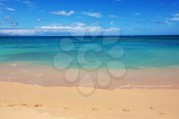 Beautiful beach with turquoise water and yellow sand
