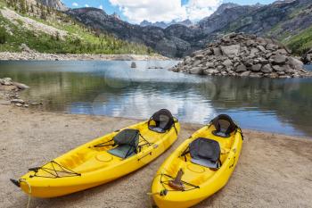 kayaking in mountains lake  in the summer season