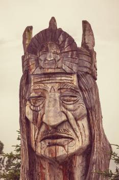 statue of an indian head totem