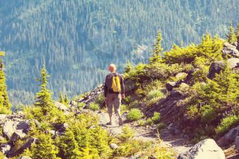 Hiking man in the mountains