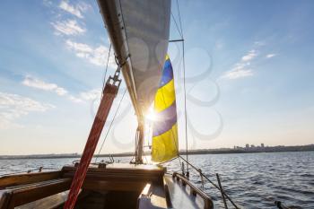 Sailing yacht on big river