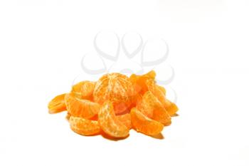 Single tangerine and segments on a white background