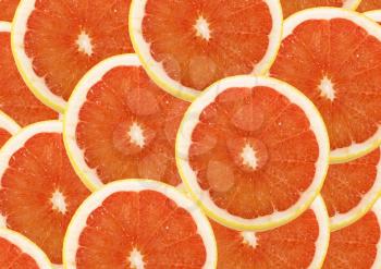 fresh grapefruit and slices background