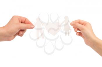 paper family in hands isolated on a white background