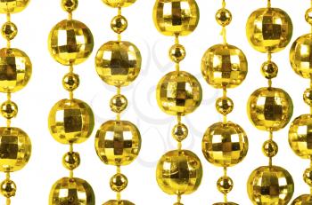 Background made of a brilliant celebratory beads of golden color