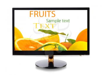 Fruits in monitor isolated on white