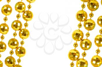 Background made of a brilliant celebratory beads of golden color