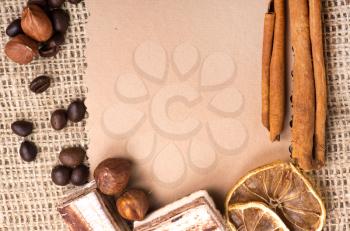 Menu Design. Old paper, coffee bean, cinnamon, lemon, burlap.