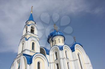 Russian orthodox church dome over blue sky
