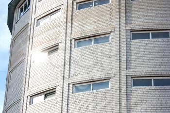 Many-storeyed garage from a white brick for cars