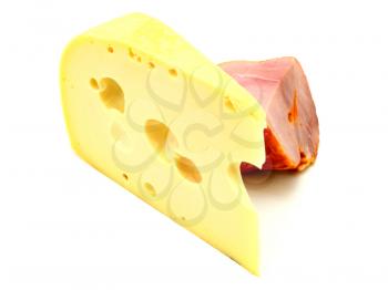 Piece of yellow cheese with a meat piece on a white background