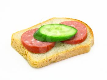 Healthy sandwich with sausage and a cucumber on a white background