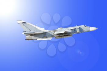 Military jet bomber Su-24 against the blue sky