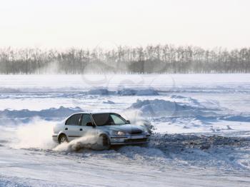 Car on winter road.