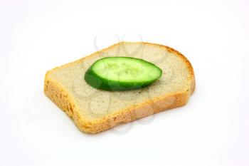 Healthy sandwich with a cucumber on a white background
