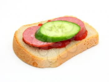 Healthy sandwich with Ketchup sausage and a cucumber on a white background
