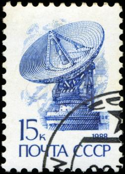USSR - CIRCA 1988: A stamp printed in USSR shows Space exploration , series Emblem , circa 1988
