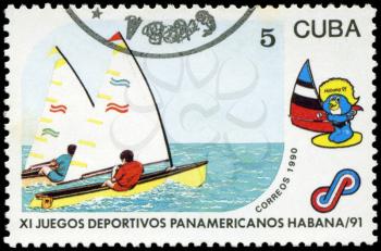 CUBA - CIRCA 1990: A post stamp printed CUBA, 1991 Pan American Games in Havana, Cuba, yacht sport , circa 1990