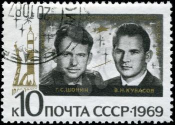 USSR - CIRCA 1969: A Stamp printed in the USSR shows the crew of the Soviet spaceship Union G.S.Shonin, V.N.Kubasov, circa 1969