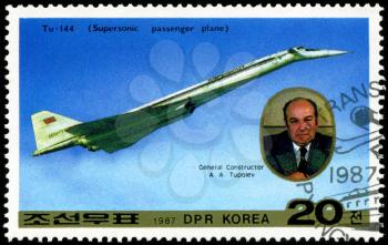 DPR KOREA - CIRCA 1987: A stamp printed in DPR Korea (North Korea) shows Tu-144 and General Designer Tupolev, circa 1987