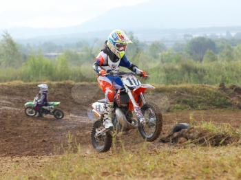 ARSENYEV, RUSSIA - AUG 30: Rider participates in the  round of the 2014 Russia motocross championship on August 30, 2014 in Arsenyev, Russia.