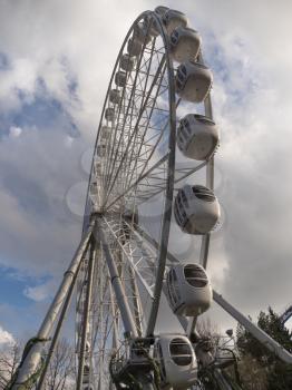 Atraktsion colorful ferris wheel against the sky.