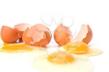 broken eggs isolated on white background