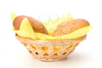 fresh warm rolls in breadbasket isolated on white background