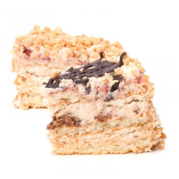 Slice of  cream cake isolated on white background