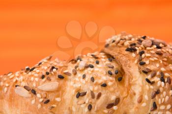fresh croissant  on orange background