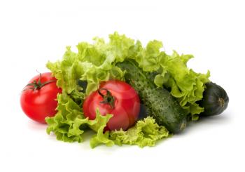 Tomato, cucumber vegetable and lettuce salad isolated on white background