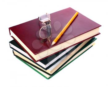 books is glasses and pencil isolated on white background