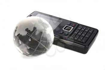 glass globe and mobile telephone isolated on white background