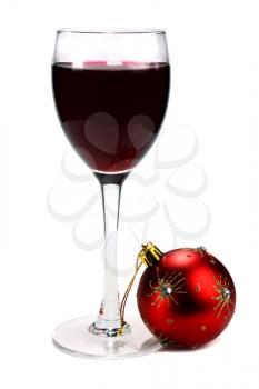 glass of red wine and decoration for ?hristmas isolated on white background
