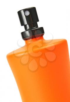 orange small bottle with a perfume liquid isolated on white background