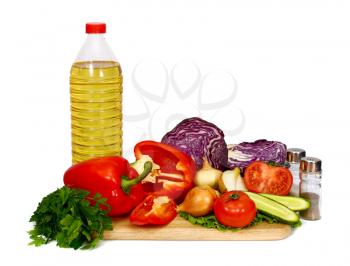 sunflower seed oil and vegetables for preparation of salad isolated on white background