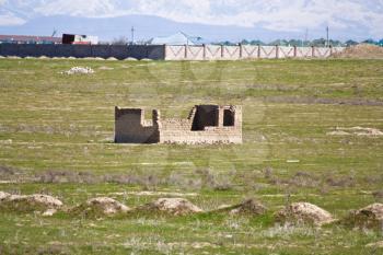 unfinished house of adobe bricks