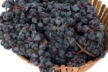 black grapes in a basket  
