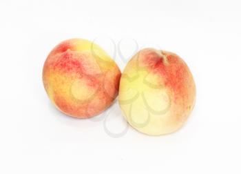 two peaches on white background 