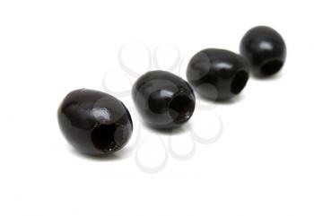 Black olives on a white background
