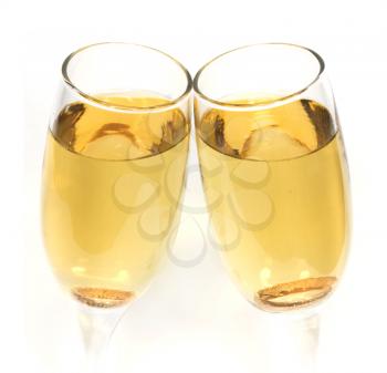 Pair of champagne glasses making a toast