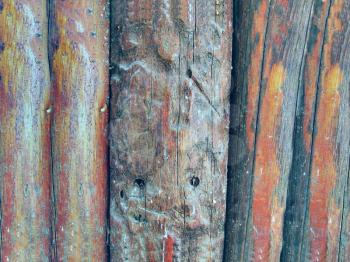 Close up of gray wooden fence panels 
       