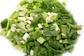 fresh chopped green onions isolated on white 
