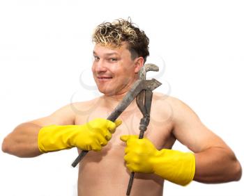 wrench in yellow rubber gloves on white background