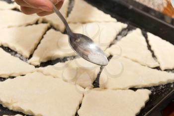 dough on a baking sheet on the cookie