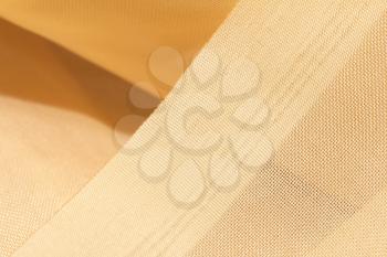 golden fabric as a background. macro